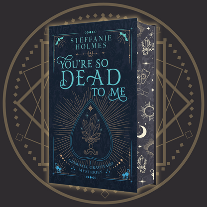 Signed hardcover edition of 'You're So Dead To Me' by Steffanie Holmes, featuring a black cover with gold and teal accents, and illustrations 